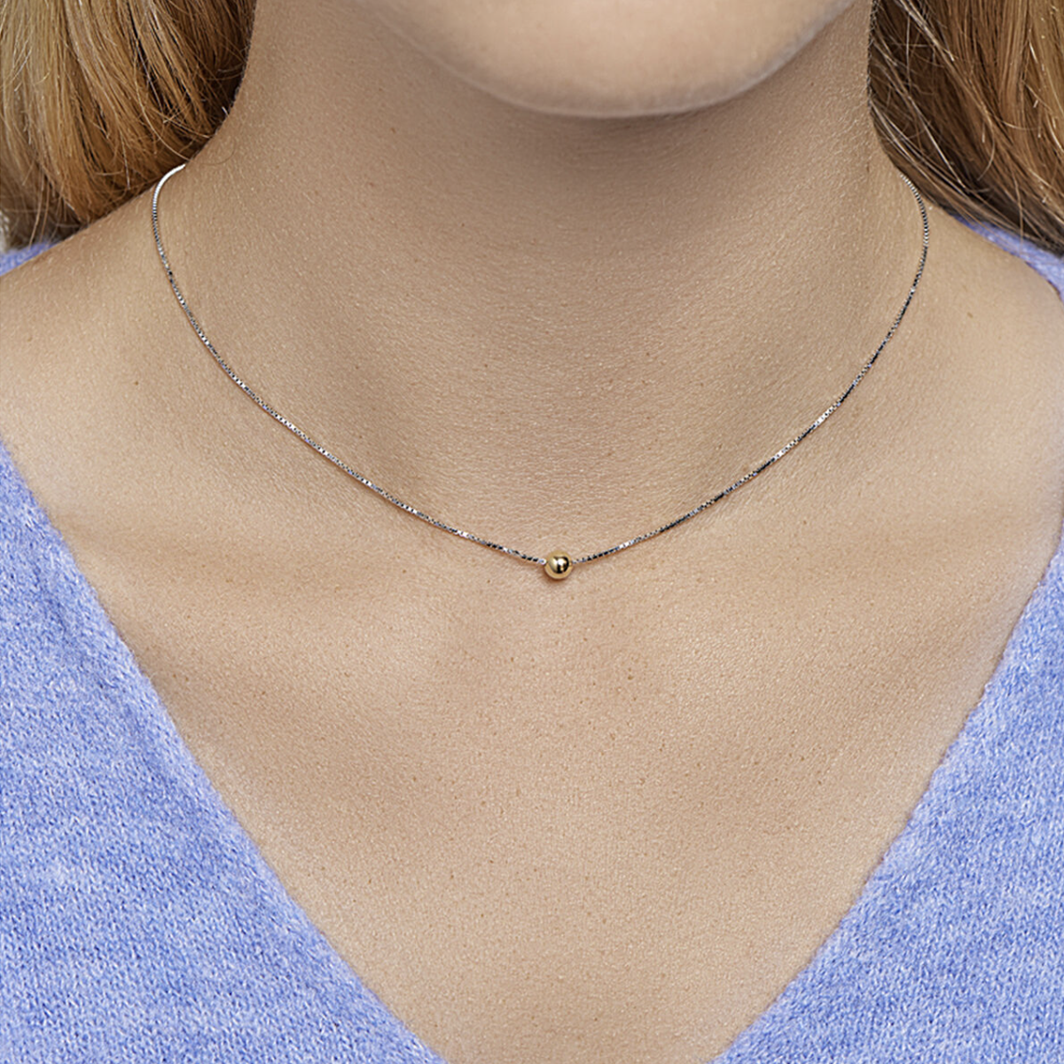 zilveren collier met gouden bolletje