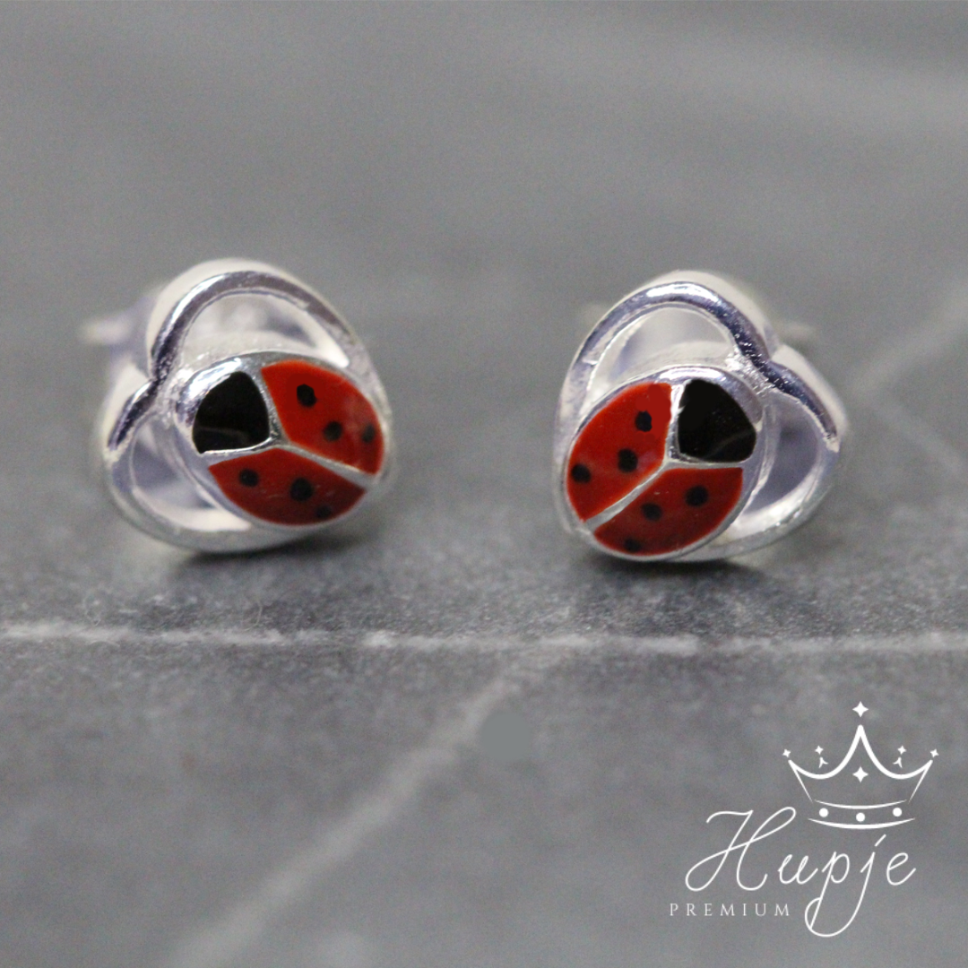 zilveren kinderoorbellen lieveheersbeestje hartje