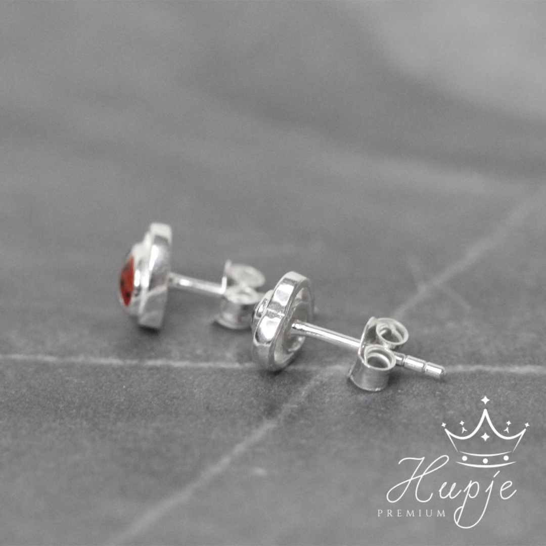 zilveren kinderoorbellen lieveheersbeestje hartje